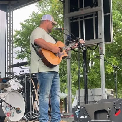 Scotty Sams on outdoor stage